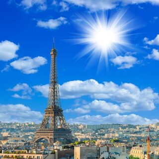 Eiffel Tower and Sunny Sky Wallpaper Mural