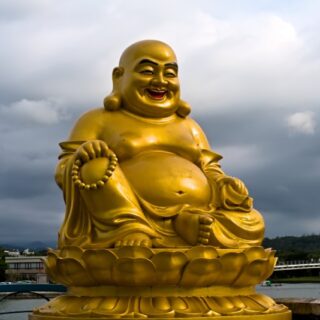 Golden Laughing Buddha Statue Wallpaper Mural