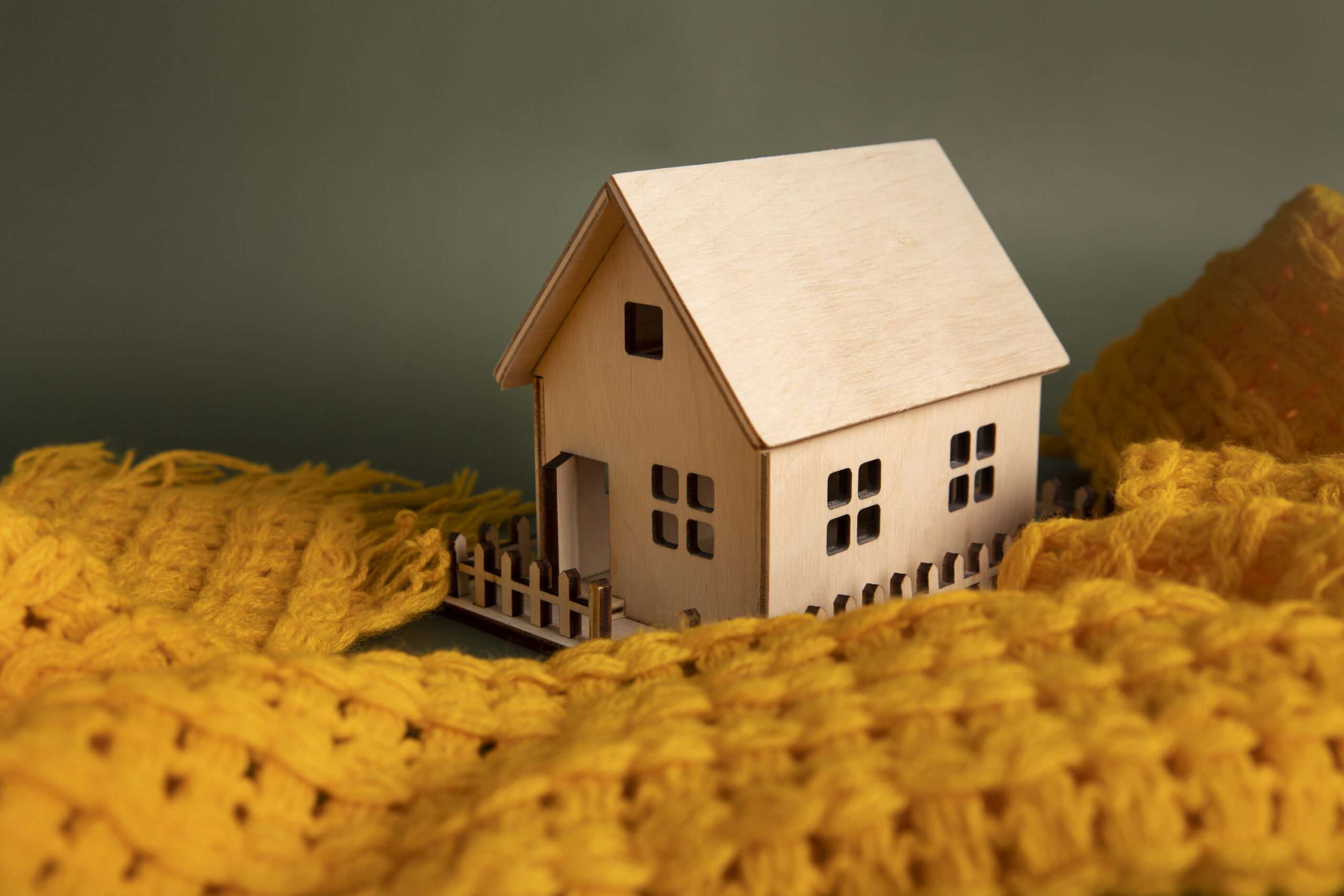 cozy-house-concept-with-wooden-toy-house