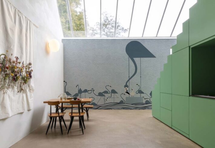 Flamingo Sonata, Serene Cranes in a Whispering Waves Wallpaper Mural mockup